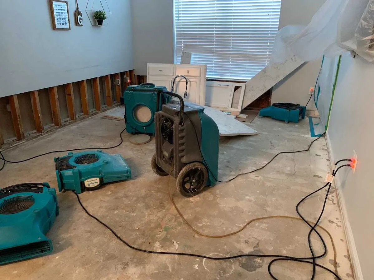 Dehumidifier in flood-cut room for Water Damage Restoration in Waunakee
